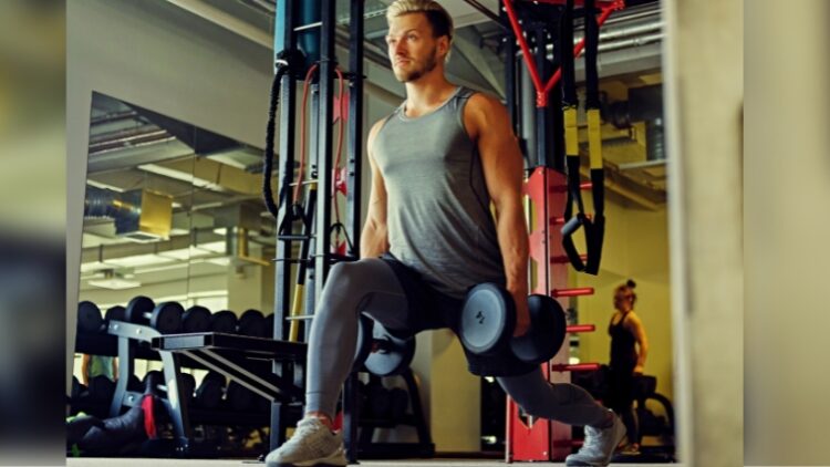 A person doing the dumbbell split squat