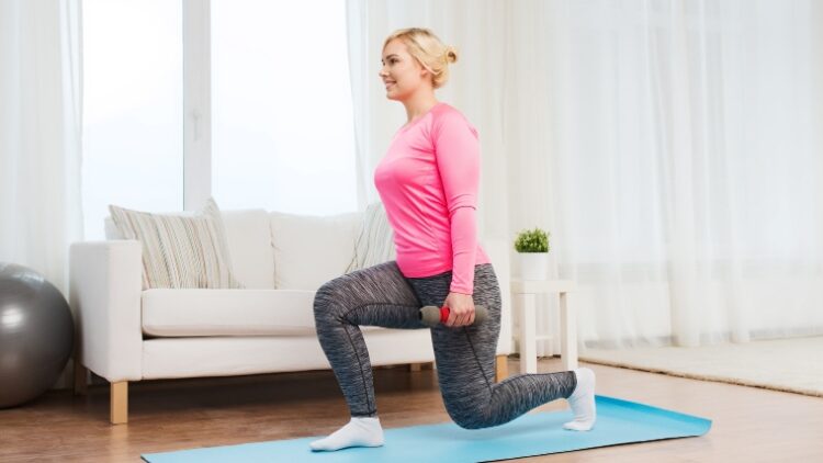 A person doing the dumbbell split squat.