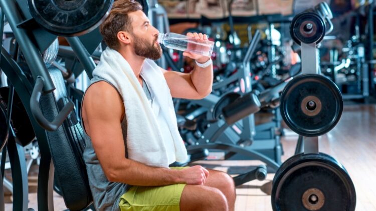 A person drinking water.