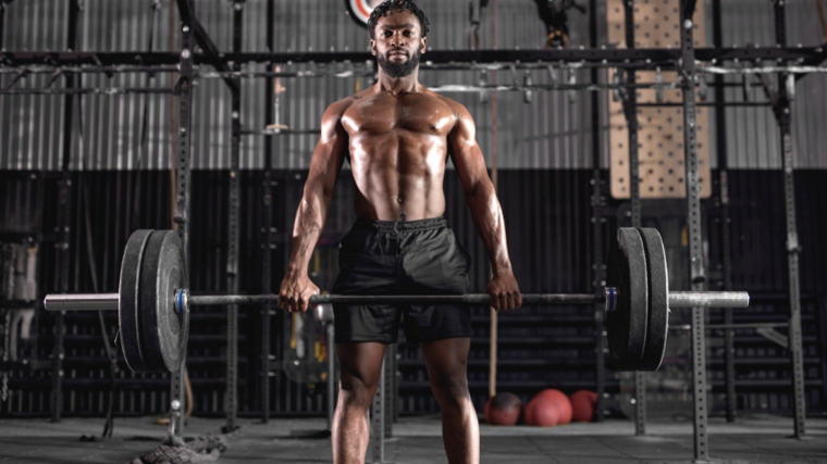 A person lifting a barbell.