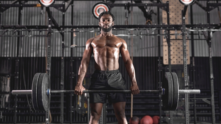 A powerlifter holding a barbell.