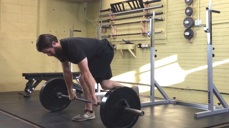 Step 4 - Return the barbell to the floor.