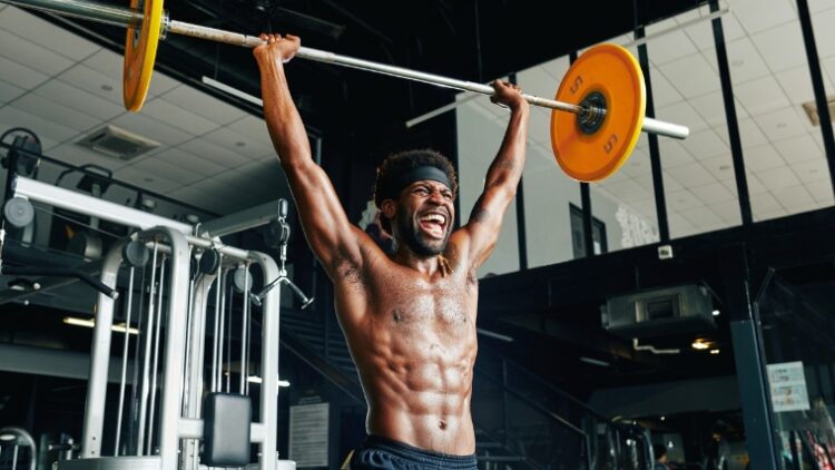 A person doing thrusters for a Crossfit fran.