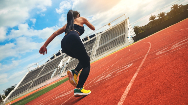 A person running in the track.