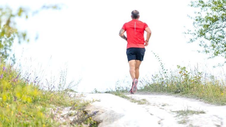  A person running up an incline.