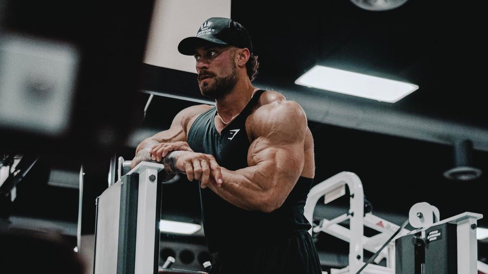 Here's How Chris Bumstead Is Training His Arms After a Biceps Tear | BarBend