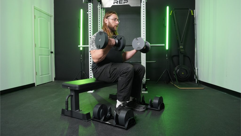 Tester uses SMRTFT Nüobell Adjustable Dumbbell for bicep curls