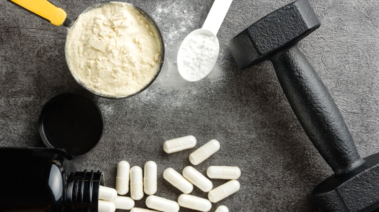 Creatine and BCAA supplement powder and capsules.
