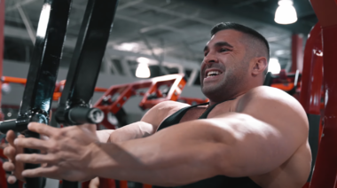 Bodybuilder Derek Lunsford on the pec deck machine.