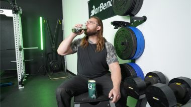 Our tester drinking AG1 greens supplement drink