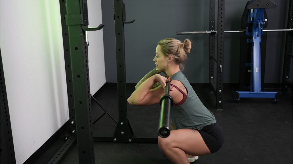 squatting with the Iron Bull Competition bar in rack