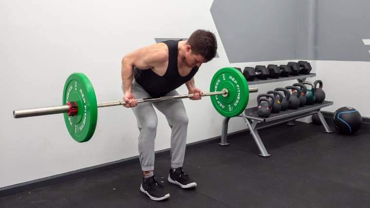  A person doing a reverse grip bent over barbell row.