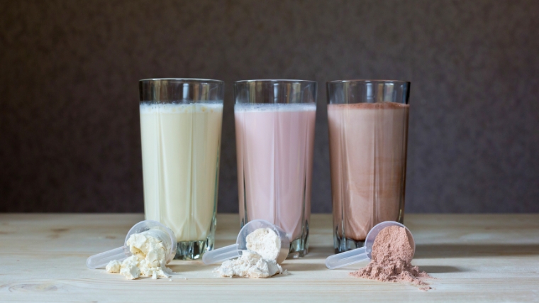 Three glasses of meal replacement shakes.