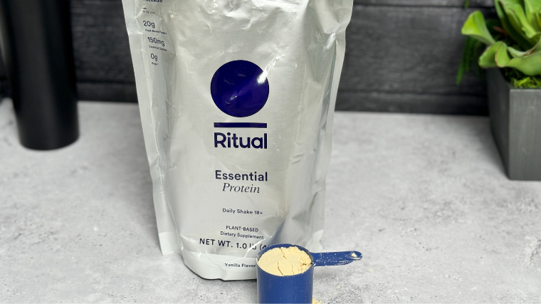 A scoop of Ritual Essential Protein Daily Shake 18+ in BarBend testing lab.