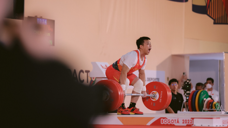Weightlifter Chen Lijun performs clean & jerk at 2022 World Weightlifting Championships