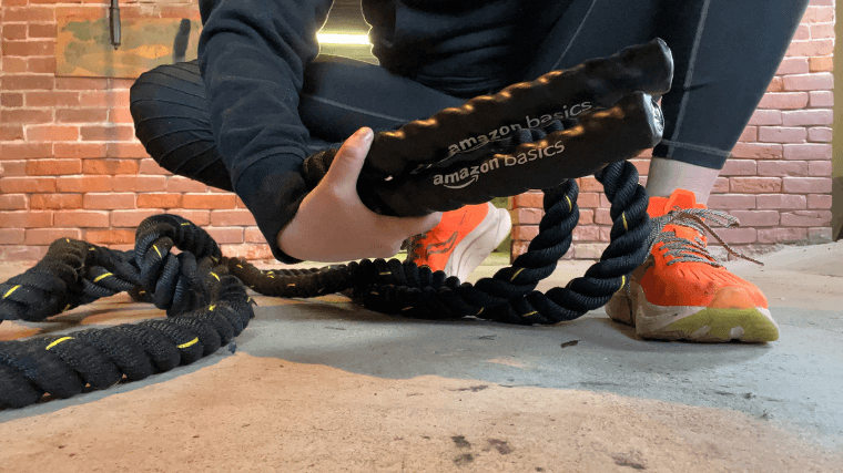 A close-up shot of the handles of the Amazon Basics Battle Ropes.