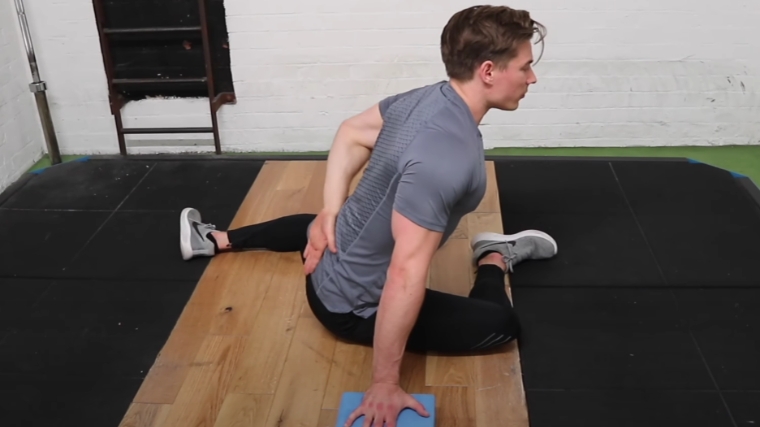 How to Do the 90/90 Stretch to Squat Heavier and Move Better