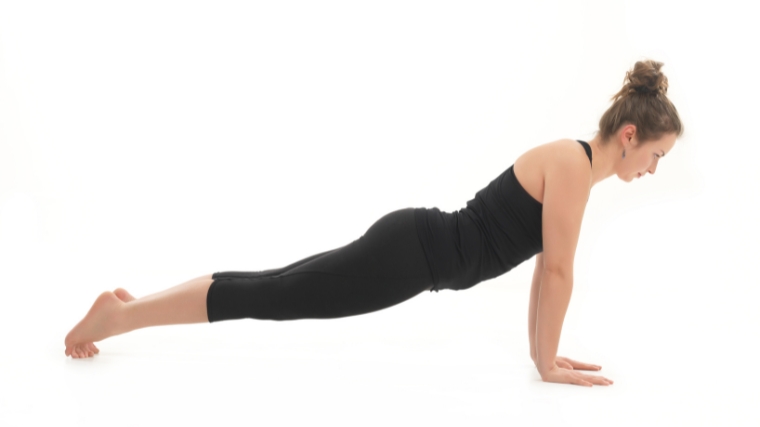 A person doing the plank with their pelvis hanging low.