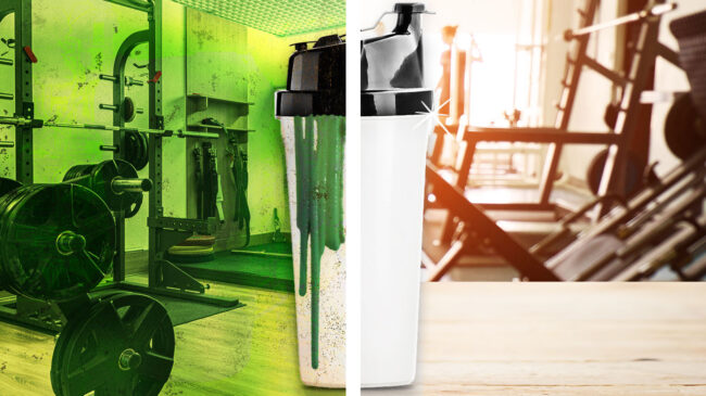 Protein shaker cup against gym background.