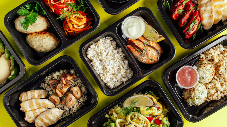 Meal prep containers full of food