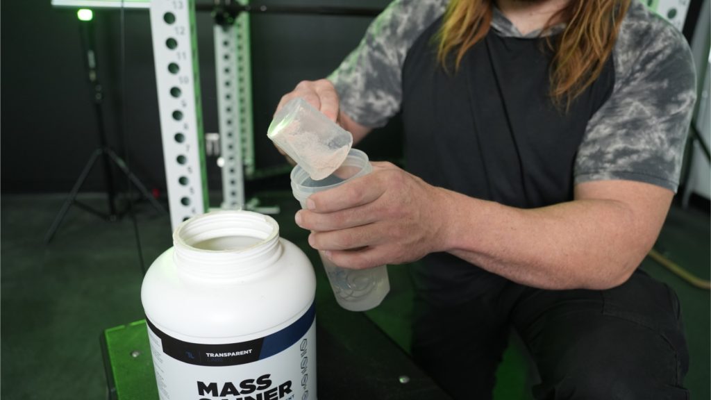 A BarBend tester trying the Transparent Labs Mass Gainer.
