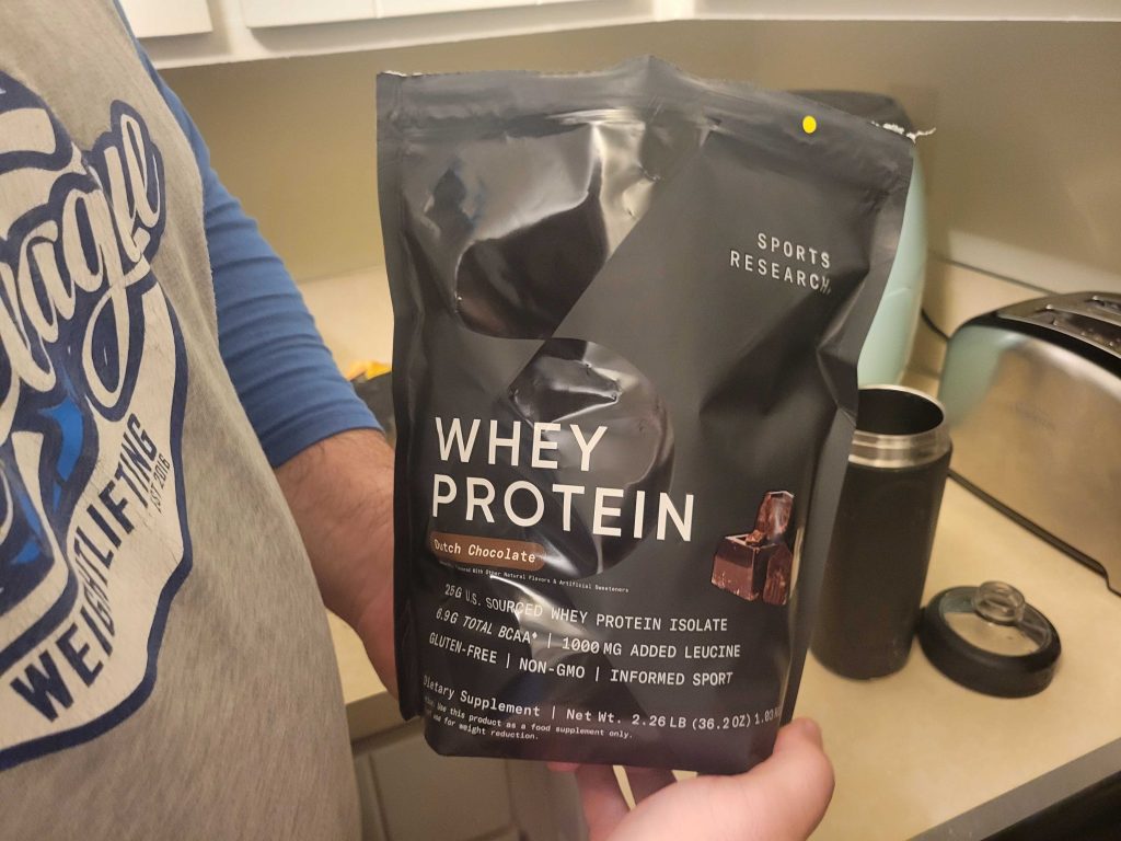 A bag of Sports Research Whey Protein Isolate.