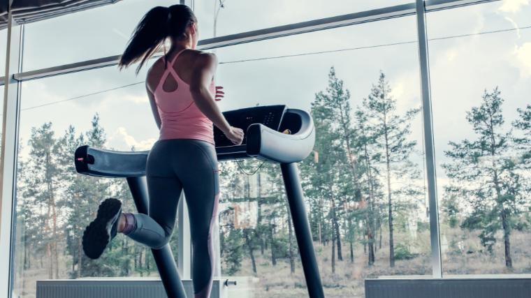 A person jogging on the treadmill.