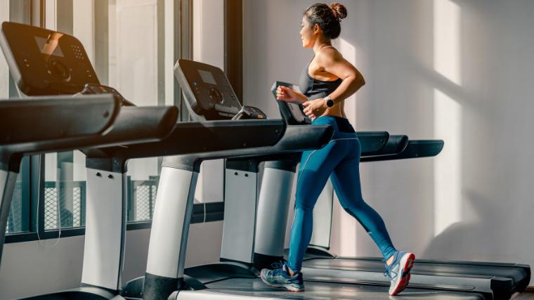 A person walking or jogging on a treadmill