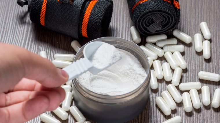 BCAA capsules and pre-workout powder.