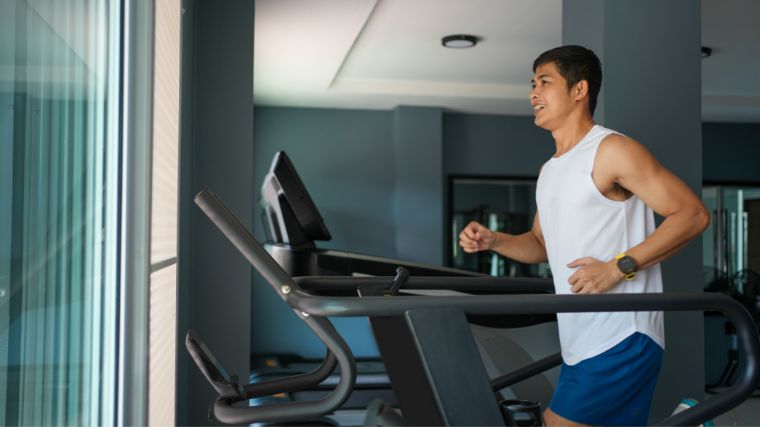 An athlete performs a tempo run on a treadmill.