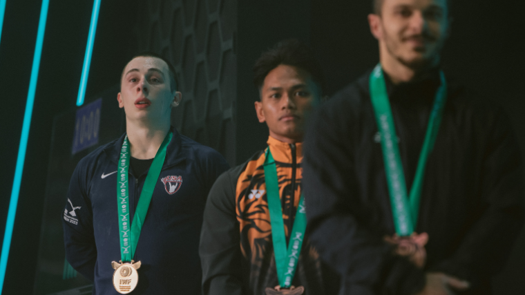 Hampton Morris celebrates his clean & jerk gold medal at 2023 World Weightlifting Championships.