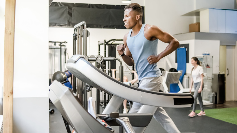 An athlete doing intense cardio on a treadmill.