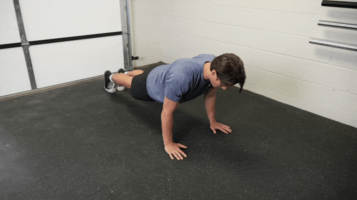 A person doing the standard push-up