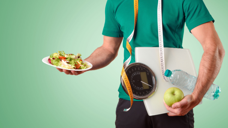 A person carrying a salad plate, measuring tape, meter scale, an apple and  a water bottle.