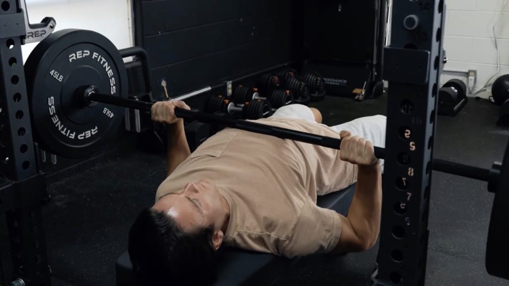 Jake bench pressing with the REP Fitness Double Black Diamond Power Bar