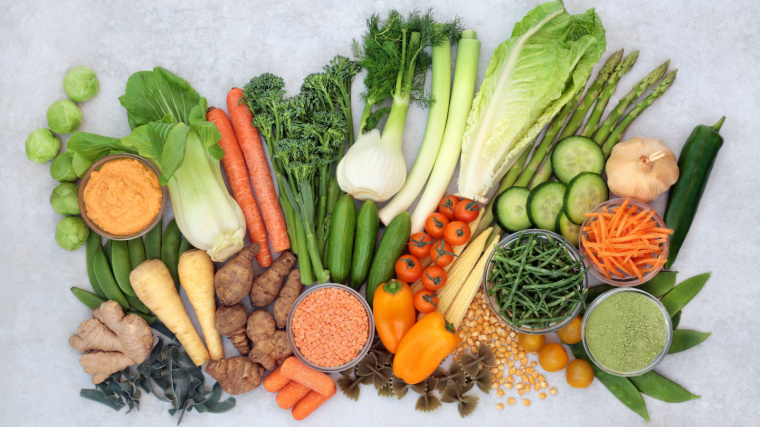 Immune boosting vegan health food with vegetables, herbs, supplement powder, legumes, pasta & dip very high in antioxidants, vitamins, minerals, smart carbs, carotenoids, protein & lycopene.