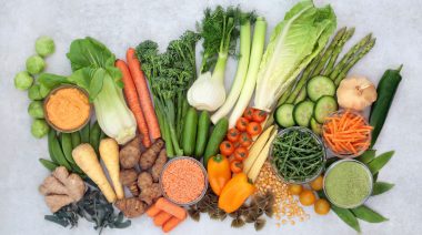 Immune boosting vegan health food with vegetables, herbs, supplement powder, legumes, pasta & dip very high in antioxidants, vitamins, minerals, smart carbs, carotenoids, protein & lycopene.