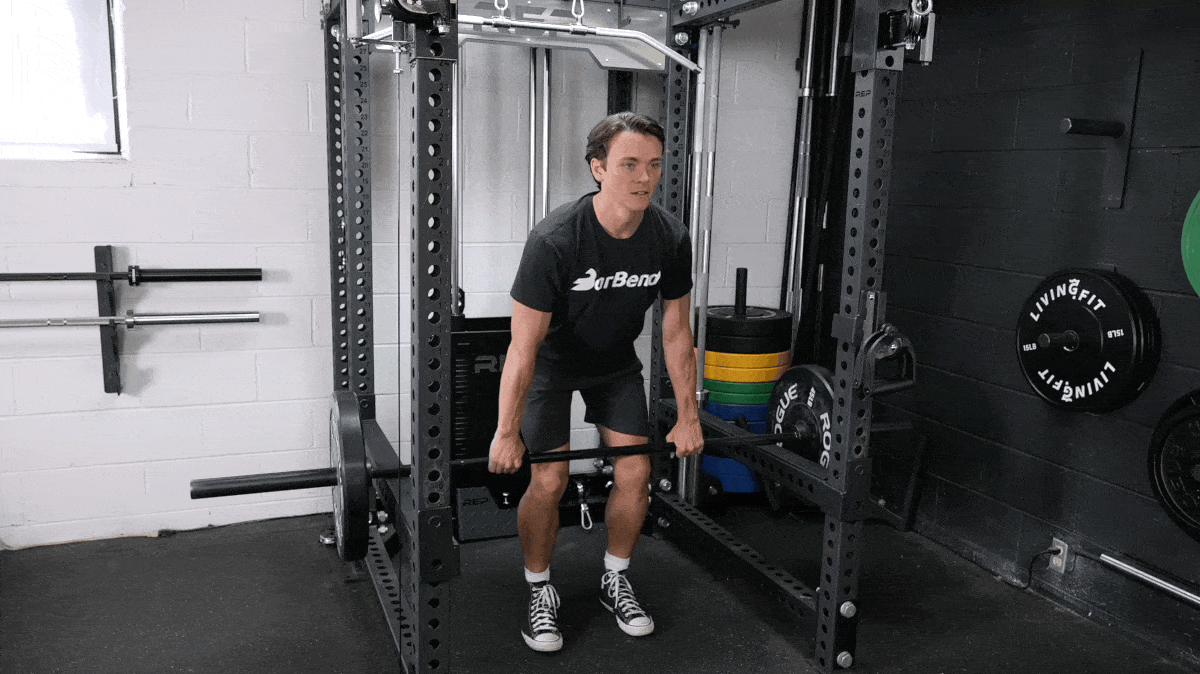 A person doing rack pulls