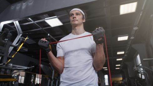 The Key Differences Between Free Weights vs. Resistance Bands | BarBend