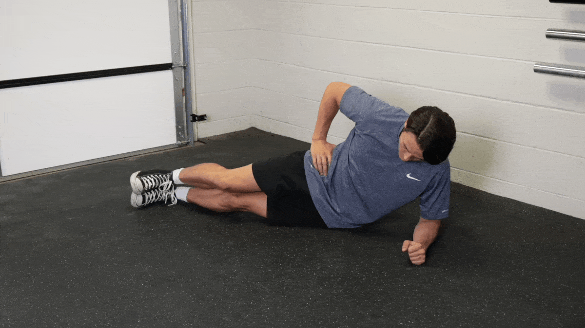 How to Do Heel Touches to Strengthen Your Obliques