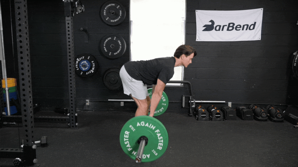 A person performing a Romanian Deadlift.