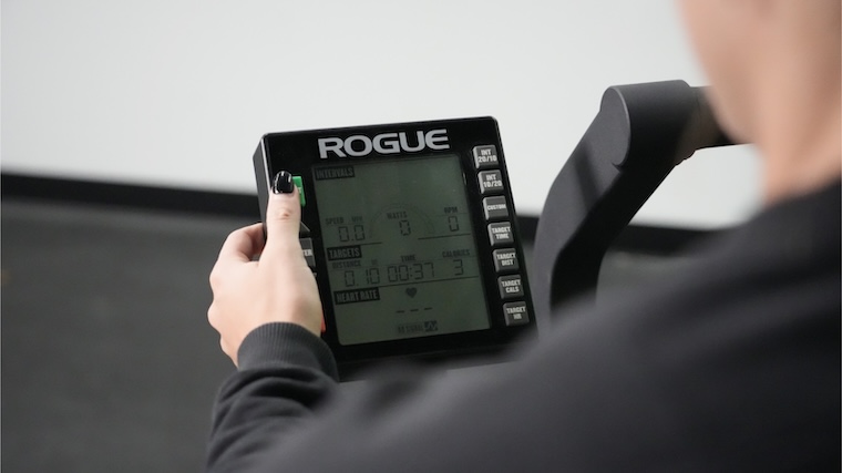 Our tester toggling through the settings available on the Rogue Echo Air Bike console