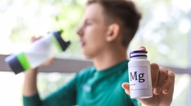 An athlete taking magnesium supplements.