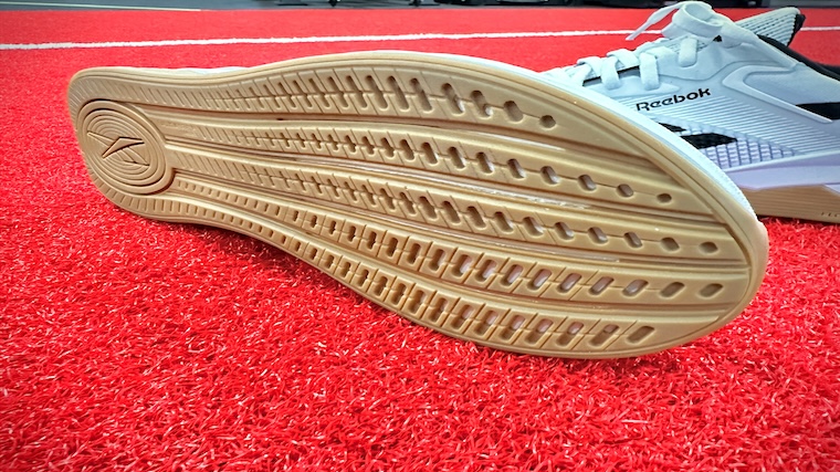 Looking at the full rubber outsole across the bottom of the Reebok Nano X4s
