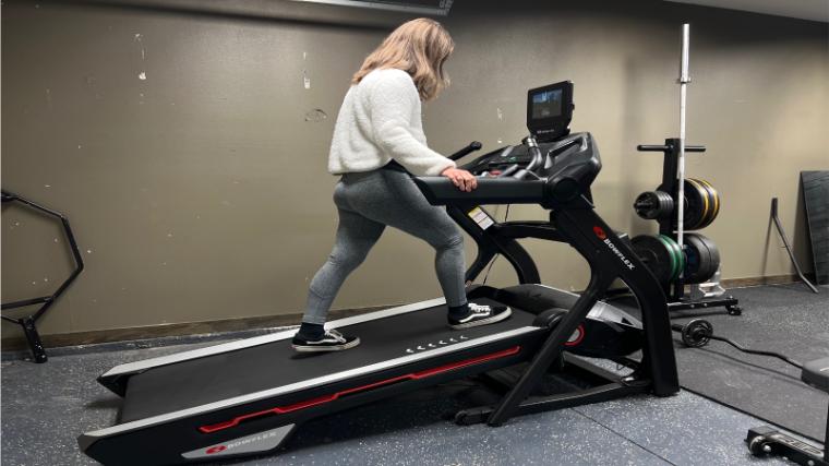 Our tester walking at an incline on the BowFlex Treadmill 10.
