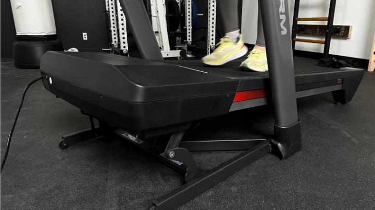 Close up of someone walking at an incline using the ProForm 9000 treadmill.