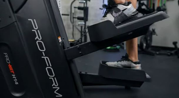 A person working out with the ProForm HIIT H14 stair climber.