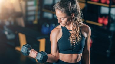 A woman performing arm exercises