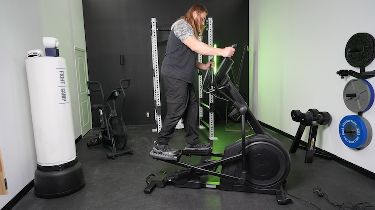 Our tester using the NordicTrack AirGlide 14i elliptical