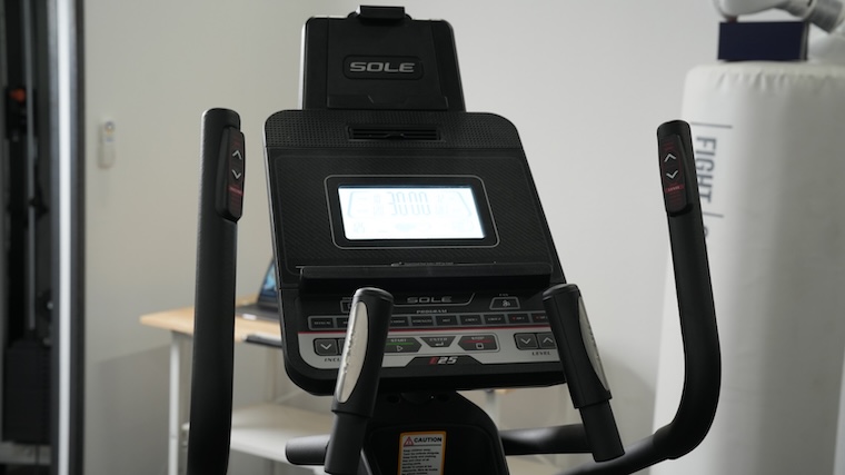 Sole E25 elliptical center console and integrated tablet holder